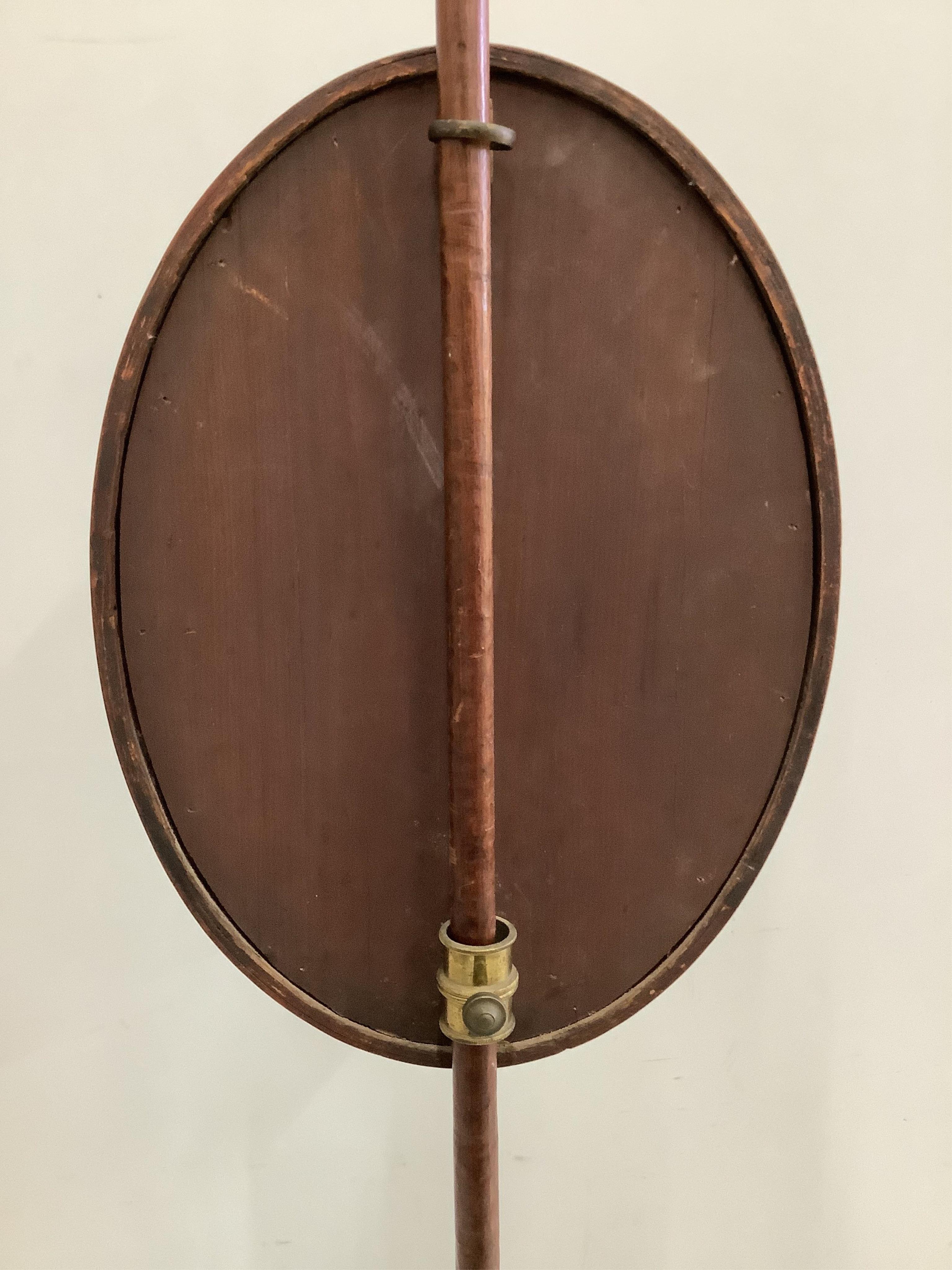An early 19th mahogany pole screen, the banner inset with Chinese silk embroidery, height 163cm